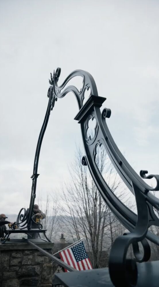 Hand-forged steel driveway archway for a mountain-side mansion in Asheville
