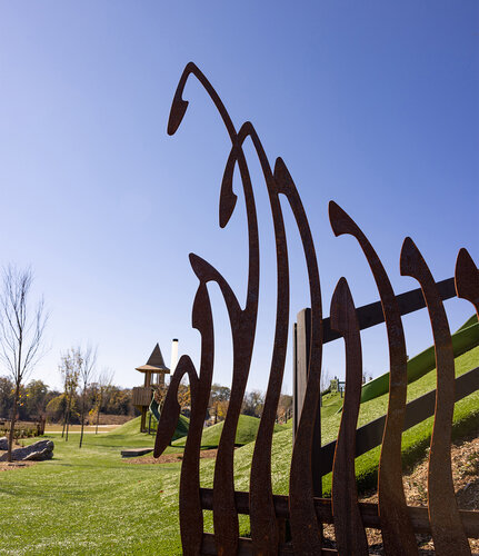 Sculptured playground fencing